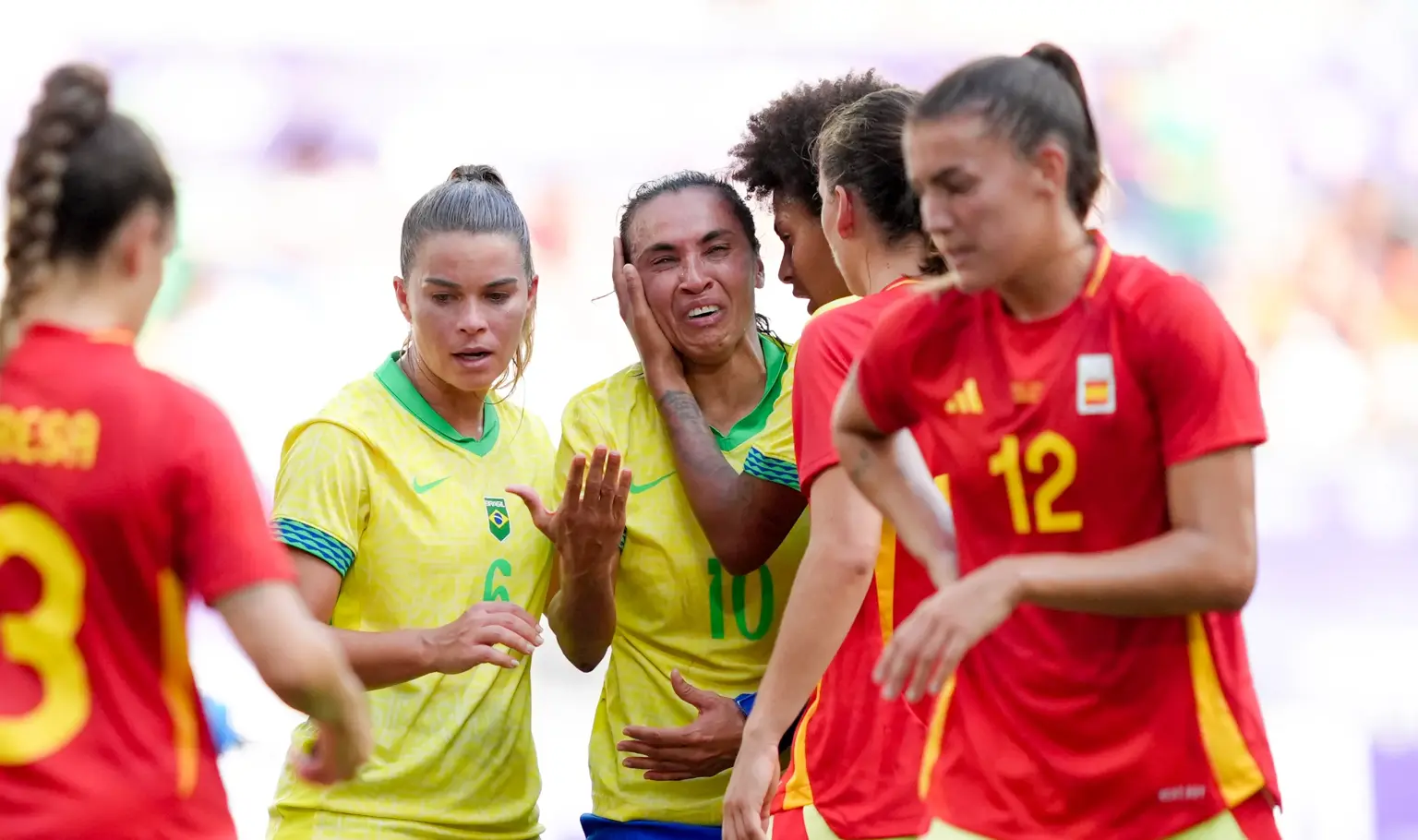 Japan advance, Brazil face anxious wait after Marta misery